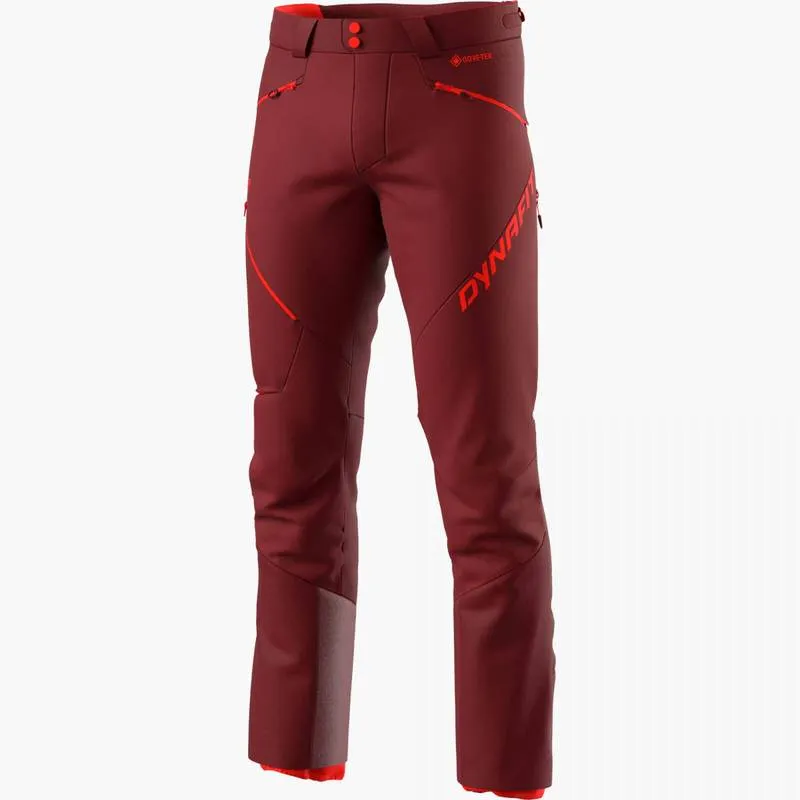 Freistehende, rote Dynafit Radical Infinium Hybrid Hose für Herren, mit roten Akzenten und Logos.