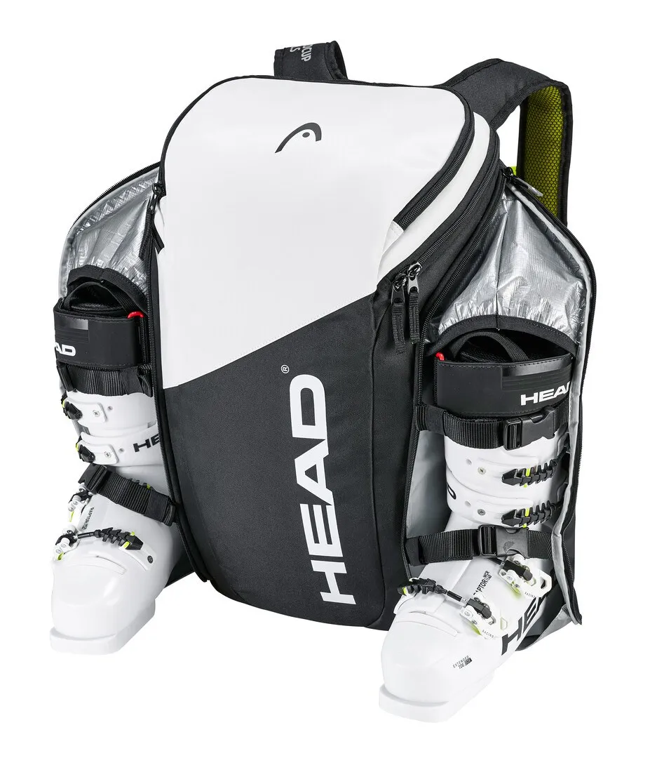 Weiß-schwarzer Head Rebels Backpack mit Skischuhen in separaten Fächern.