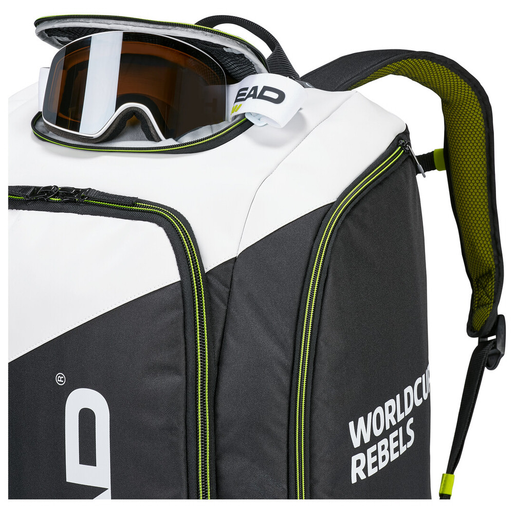 Head Rebels Racing Backpack S, schwarz-weiß mit Skibrille in Helmfach.