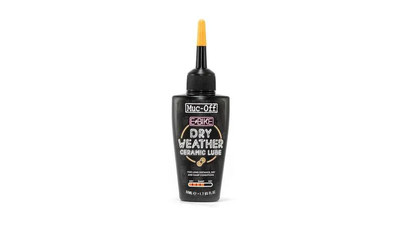 Muc-Off E-Bike Kettenöl für trockene Bedingungen, 50ml Flasche mit gelbem Applikator.