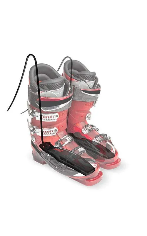 Skischuhe mit eingesetztem Lenz Space Warmer 1.0, ein Trockner mit Heizrippen und Kabel.