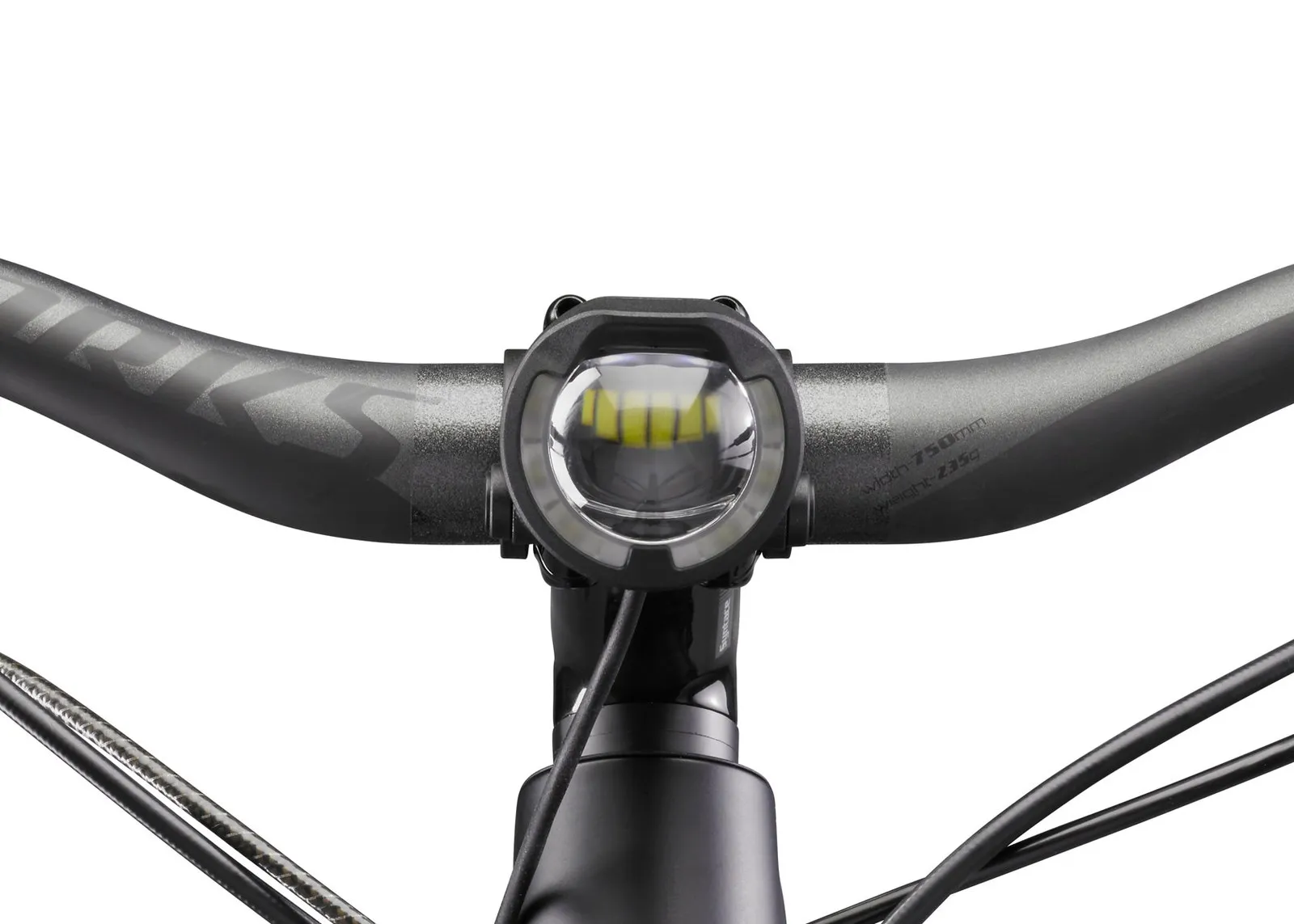 Nahaufnahme: E-Bike Lenker mit montierter Lupine SL S Yamaha Beleuchtung. Scheinwerfer zentral.