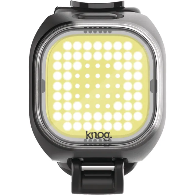 Knog Blinder Mini Square Frontleuchte, quadratisch, mit gelbem LED-Punktmuster und Markenlogo.