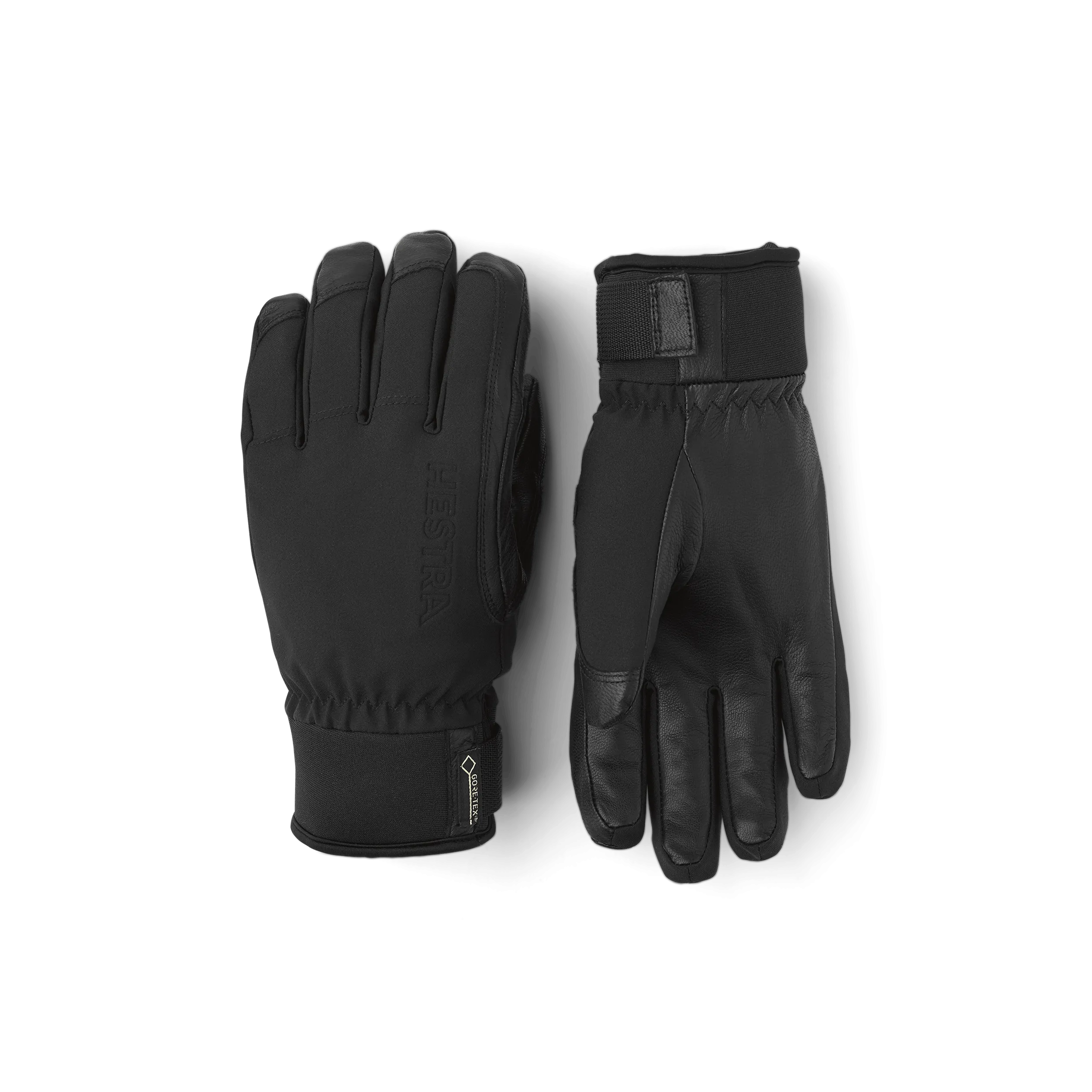 Zwei schwarze Lederhandschuhe liegen nebeneinander auf einem weißen Hintergrund. Einer zeigt die Handfläche, der andere den Handrücken.