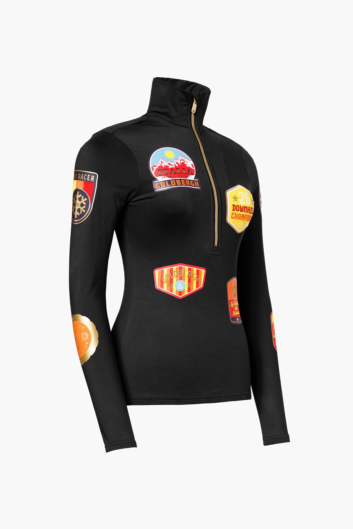 Schwarze, enge Jacke mit goldenem Reißverschluss und bunten Aufnähern, die Skirennen oder Skiurlaube thematisieren.
