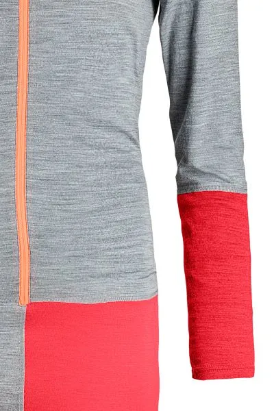 Detailaufnahme des grauen 185 RNW Overalls mit orangefarbenem Reißverschluss und roter Farbe am Arm und im Hüftbereich.