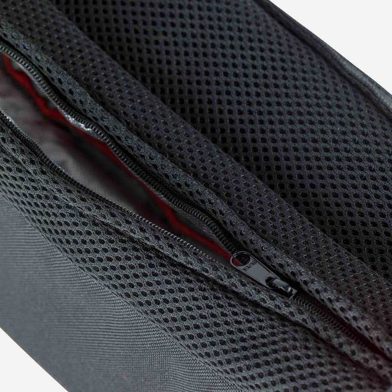 Detailaufnahme vom Rossignol Nordic Thermo Belt, zeigt Reißverschluss und Netzstruktur.