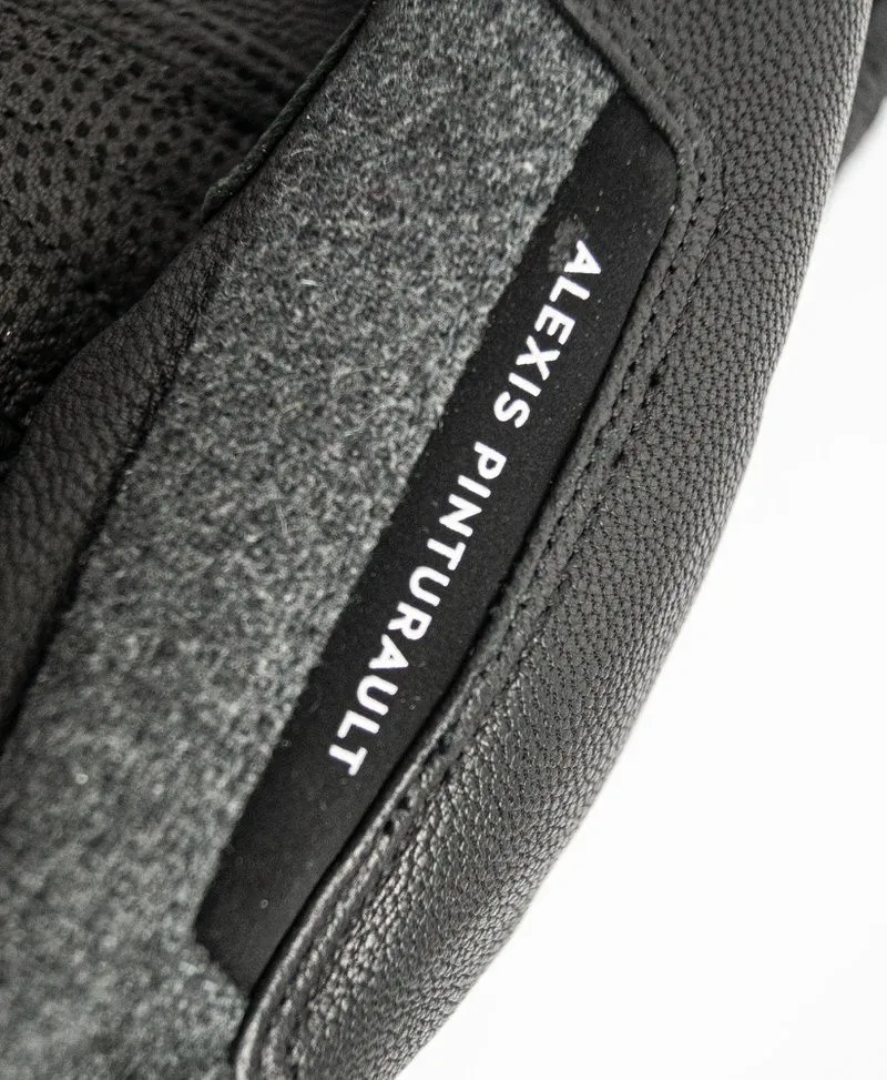 Detailansicht vom Reusch Alexis Pinturault GTX Handschuh mit Leder und Alexis Pinturault Schriftzug.
