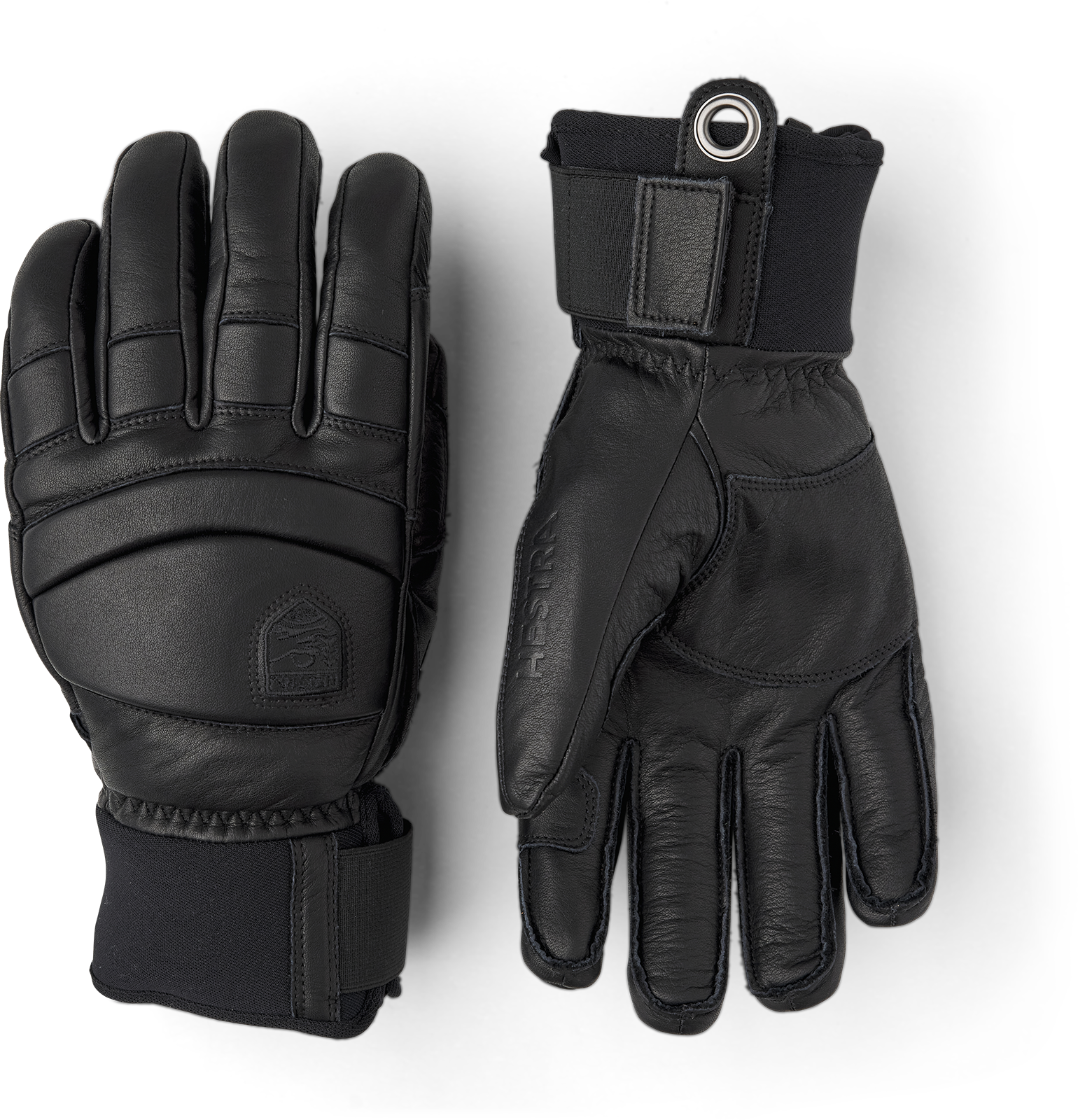 Zwei schwarze Hestra Fall Line Lederhandschuhe liegen auf einem weißen Hintergrund.
