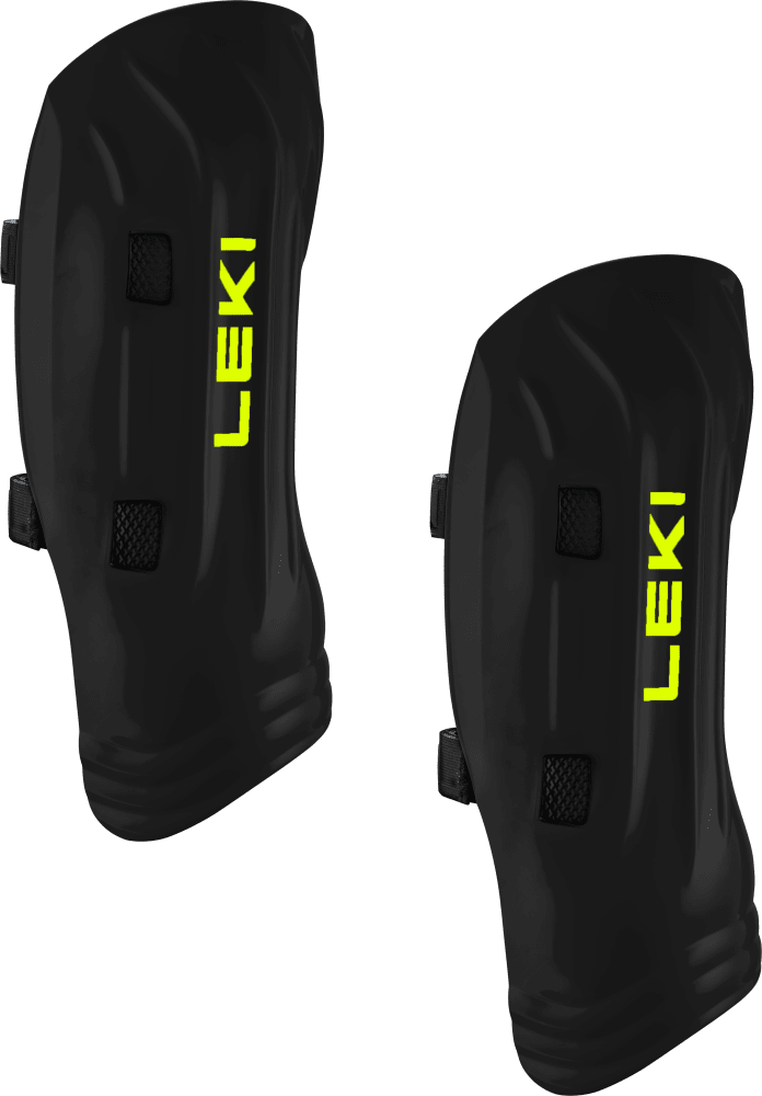 Zwei schwarze Schienbeinschoner stehen vor einem weißen Hintergrund. Auf jedem Schoner ist der gelbe Schriftzug "LEKI" vertikal angeordnet. Jeder Schoner hat zwei Befestigungspunkte mit Bändern, die sich zur Befestigung um das Bein wickeln.