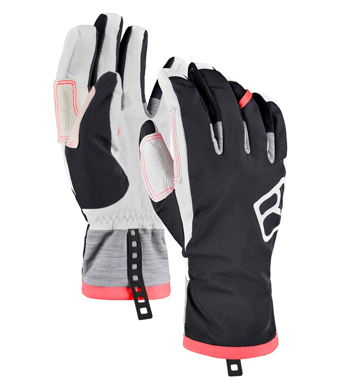Ortovox Tour Handschuhe Zwei Ortovox Tour Glove W Black Raven Ski-Handschuhe. Die Innenseiten sind weiß, die Außenseiten schwarz. An den Handgelenken befinden sich graue Bündchen.