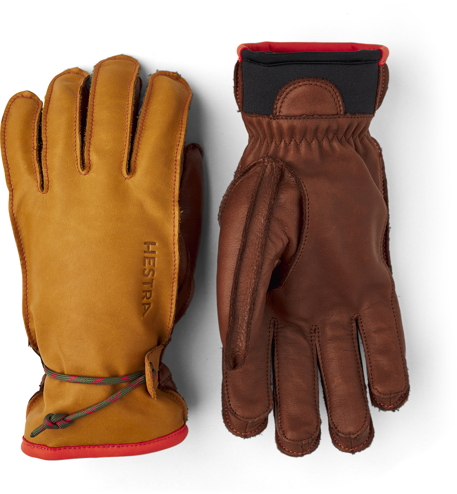 Zwei Hestra Wakayama Handschuhe, braunes und gelbes Leder mit roter Akzentuierung, liegen auf einem weißen Hintergrund.
