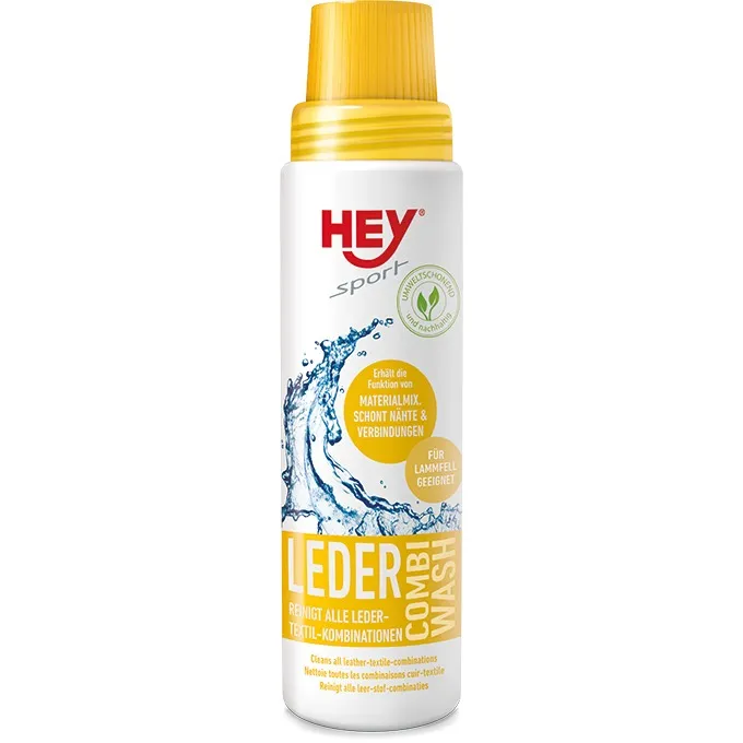 Weiße Flasche Leder Combi Wash mit gelbem Verschluss und Aufdruck. Reinigt Leder-Textil-Kombinationen.