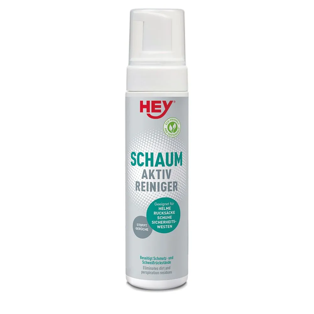 Weiße Flasche mit Sprühkopf, mit Aufschrift "Schaum Aktiv Reiniger" für Helme, Rucksäcke, Schuhe, Sicherheitswesten.