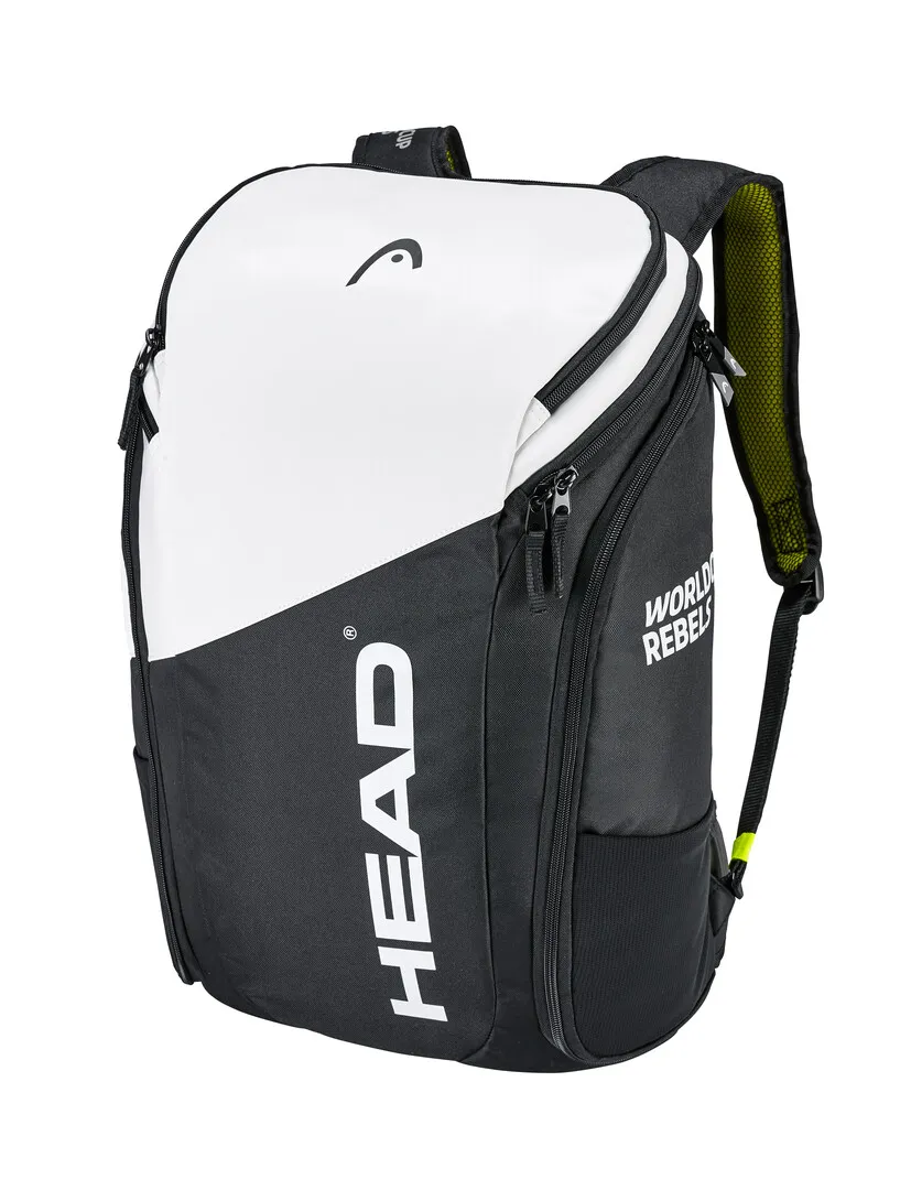 Ein Head Rebels Backpack, weiß-schwarz, mit Reißverschlüssen und Trägern, seitliche Schuhfächer und das Head Logo aufgedruckt.