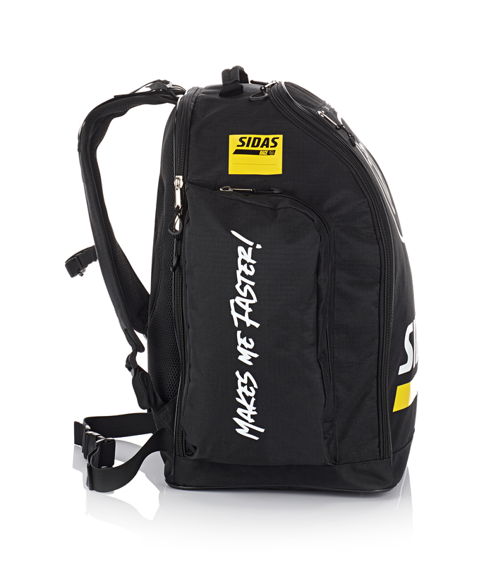 Schwarze Sidas Race Boot Bag 60L mit Tragegurten, gelbem Logo und weißem Schriftzug "MAKES ME FASTER!".