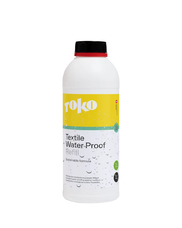 Weiße Flasche "TOKO Textile Water Proof Refill" mit gelbem Etikett und Wassertropfen, schwarzer Deckel.
