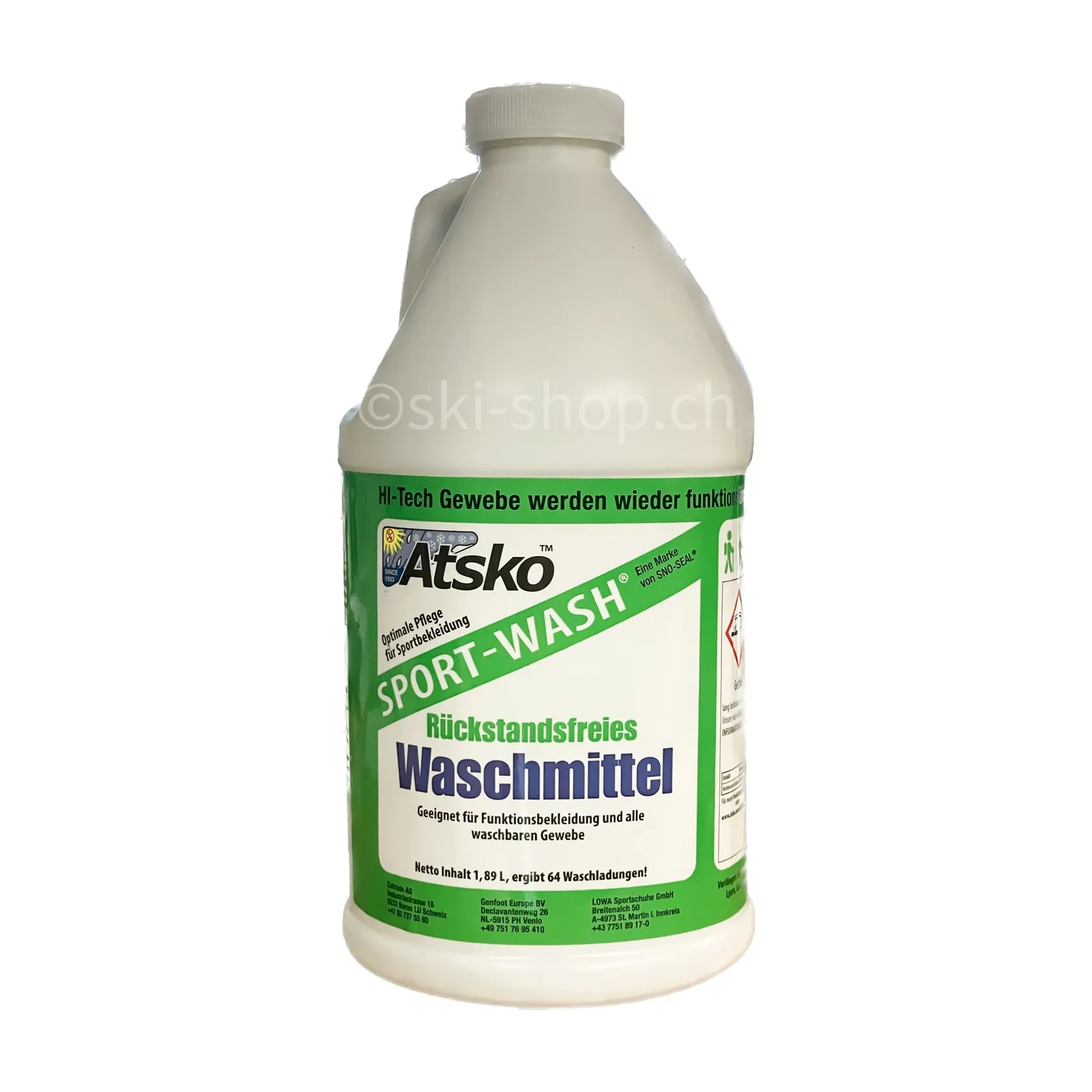 Weiße Flasche Sport-Wash Waschmittel mit grünem Etikett für atmungsaktive Sportbekleidung.