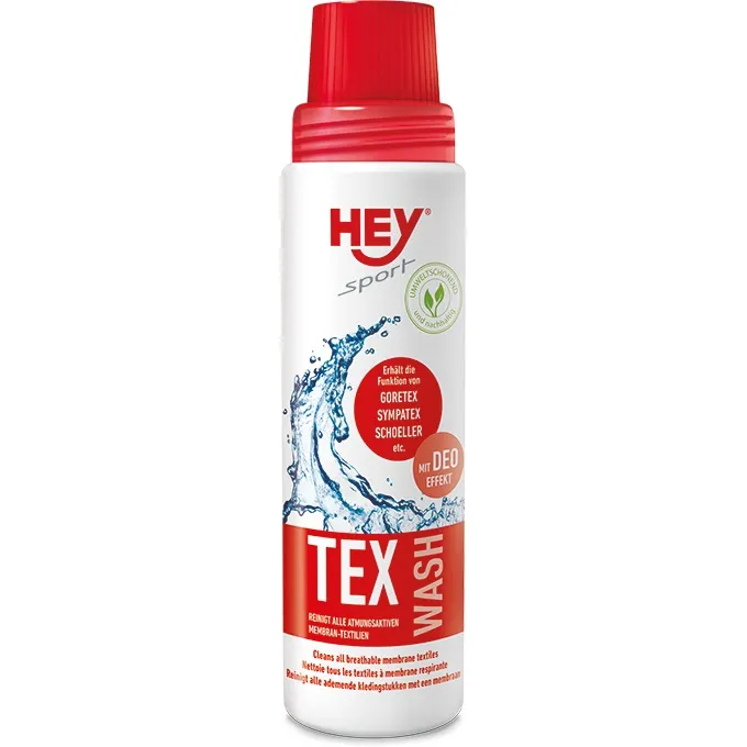 Weiße Flasche mit rotem Deckel, Aufdruck: Hey Sport Tex Wash, geeignet für Goretex, Sympatex, Schoeller Membranbekleidung.