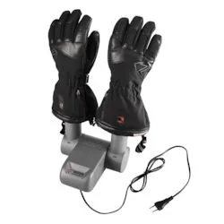 Zwei schwarze Lederhandschuhe auf einer grauen Ladestation mit Kabel und Stecker.