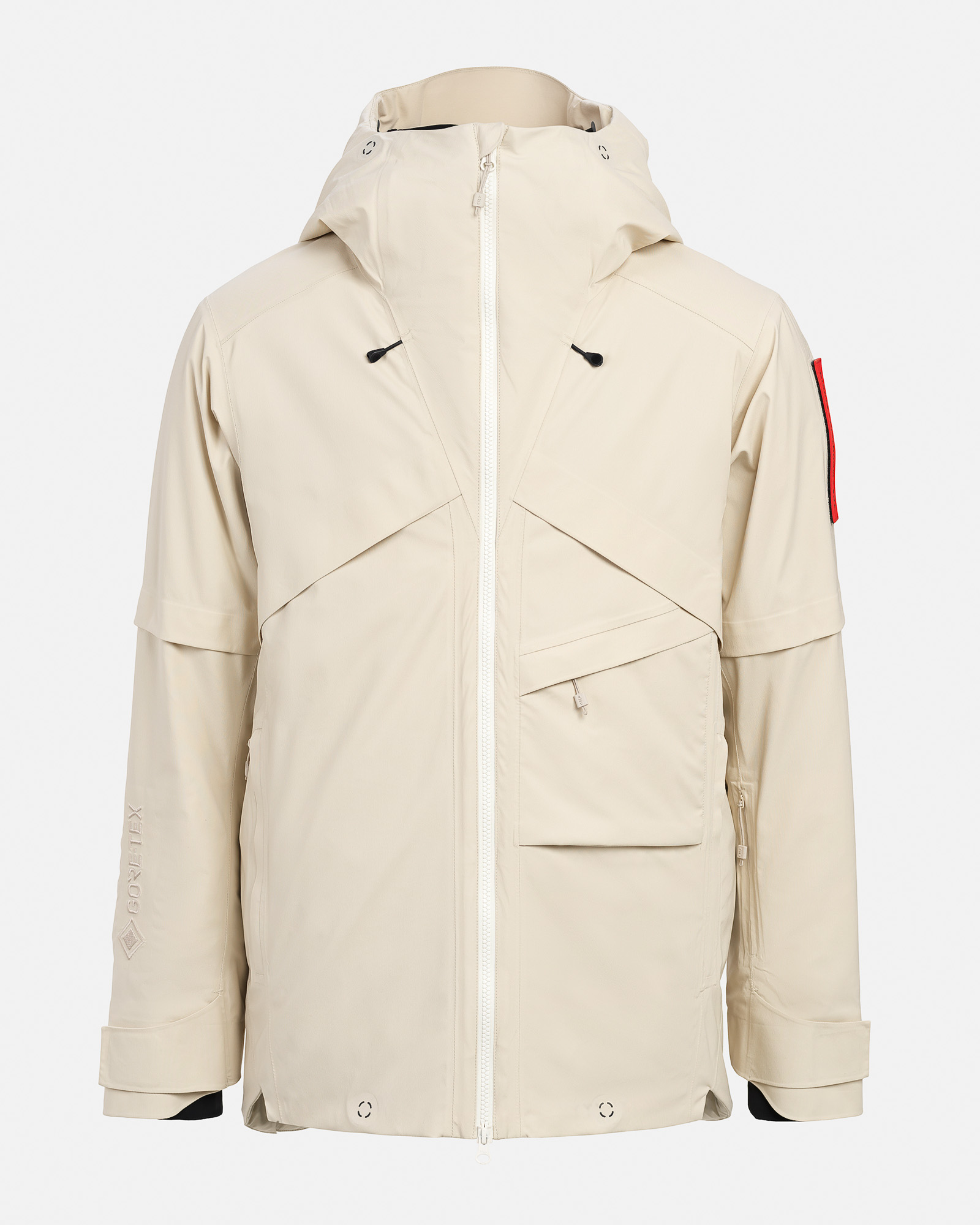 Beige Gore-Tex 2L Stretch Ski-Jacke mit Kapuze, weißem Reißverschluss, Taschen und rotem Detail am Arm.