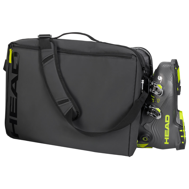 Graue Head Skischuhtasche mit einem grauen Skischuh, dessen gelbe Details sichtbar sind.