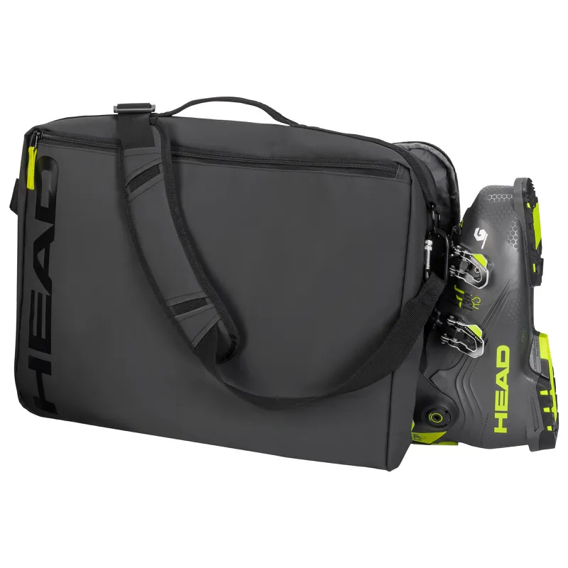 Graue Head Skischuhtasche mit einem grauen Skischuh, dessen gelbe Details sichtbar sind.