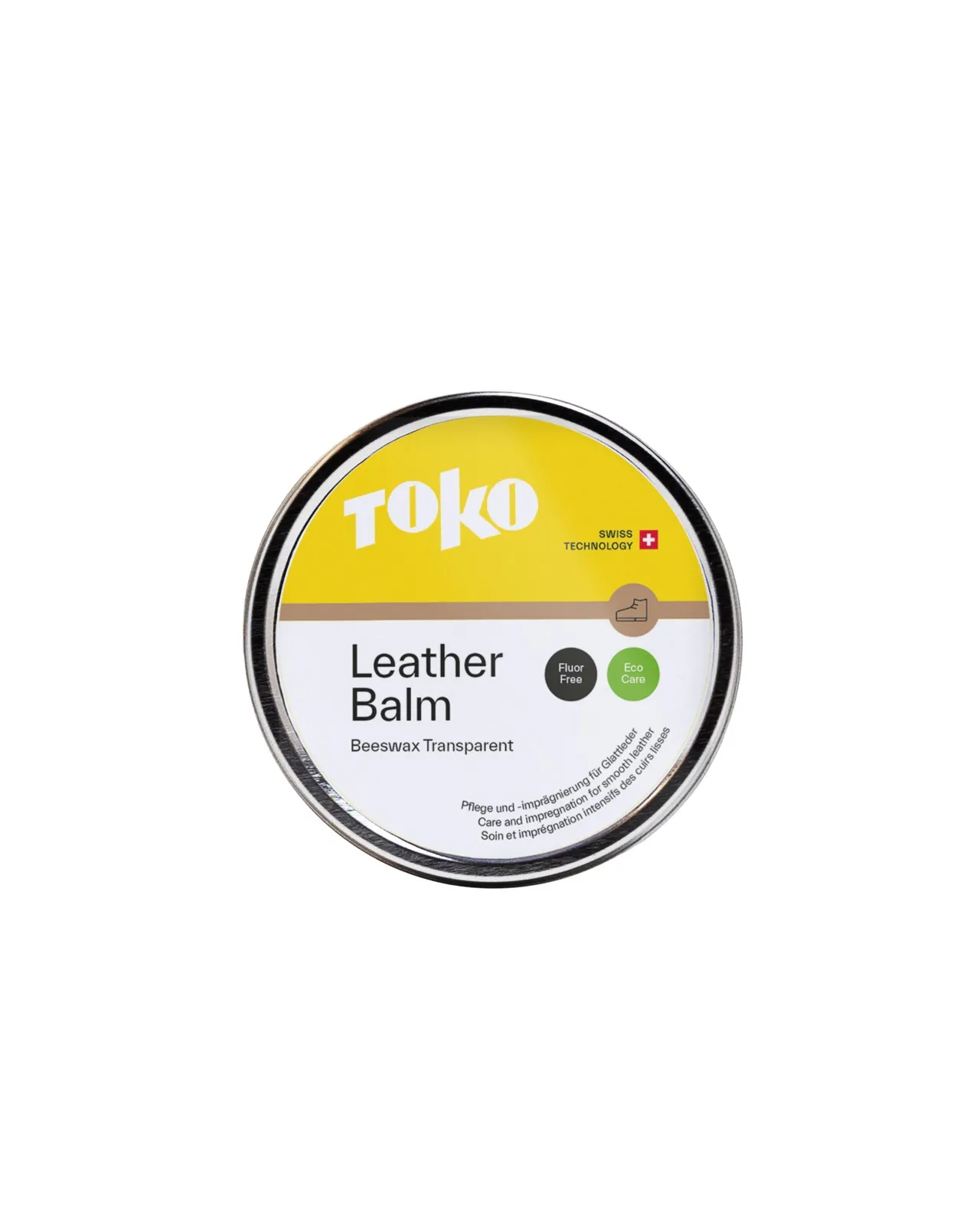 Ein rundes, silbernes Behältnis mit einem gelben Etikett mit dem Text "TOKO Leather Balm". Das Produkt ist transparent und enthält Bienenwachs.