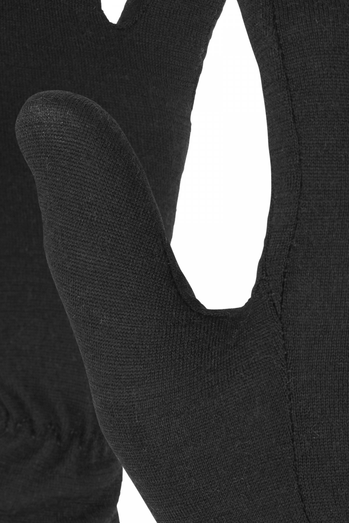 Schwarzer Ortovox Merino Handschuh Nahaufnahme eines schwarzen Ortovox Merino Handschuhs, Fokus auf Textur und Passform.