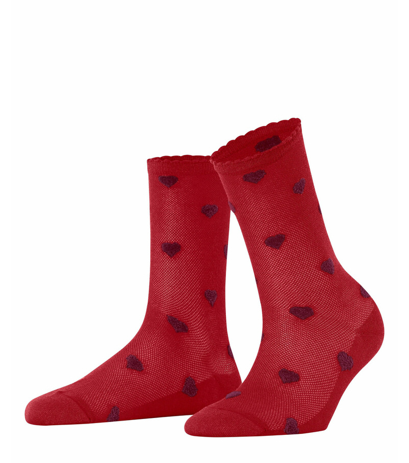 Rote Velour Socken mit Herzen Zwei rote, durchsichtige Velour Beat Socken mit kleinen, dunkleren Herzen und gerüschtem Bündchen.