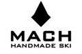 Schwarzes Logo von „MACH Handmade Ski“ mit einer stilisierten Bergspitze über dem Markennamen.
