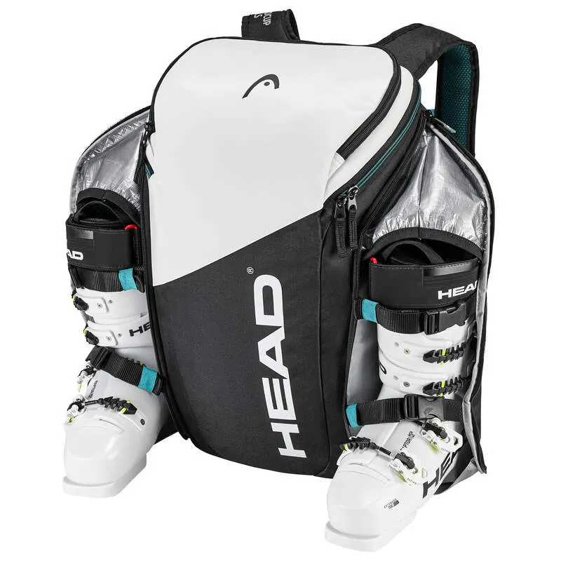 Weiß-schwarzer Head Rebels Backpack mit Skischuhen in seitlichen Fächern.