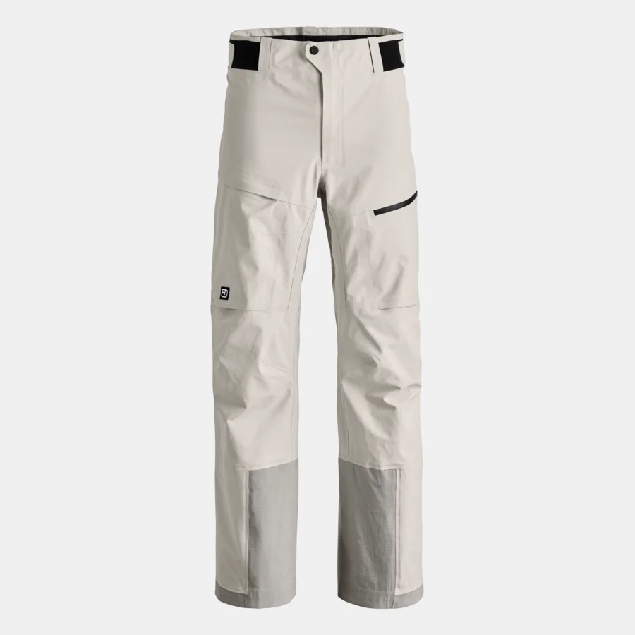 Helle Hose mit schwarzem Bund, Reißverschlusstasche, Logo am Bein und verstärkten grauen Beinenden.