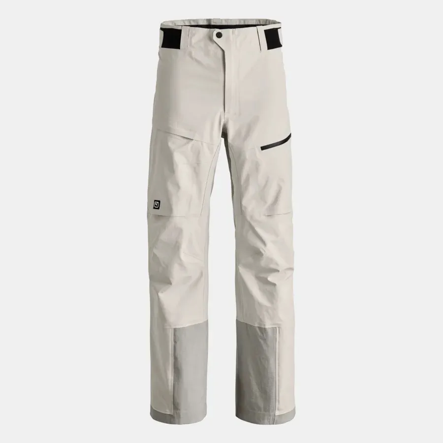 Helle Hose mit schwarzem Bund, Reißverschlusstasche, Logo am Bein und verstärkten grauen Beinenden.