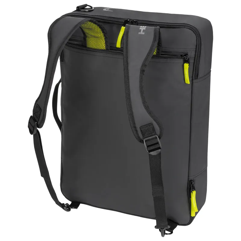 Graue Head Skischuhtasche mit Rucksackgurten und gelben Reißverschlüssen.