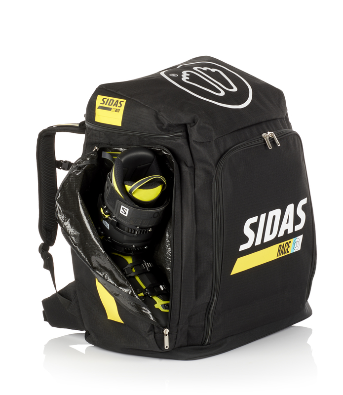Schwarze Sidas Race Boot Bag mit Skischuh im geöffneten Fach, Logos und gelben Akzenten.