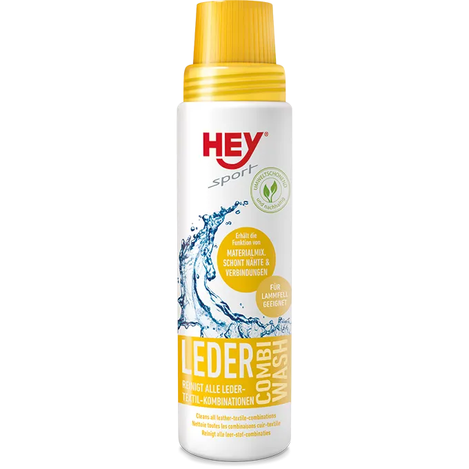 Weiße Flasche Leder Combi Wash mit gelbem Verschluss und Aufdruck. Reinigt Leder-Textil-Kombinationen.