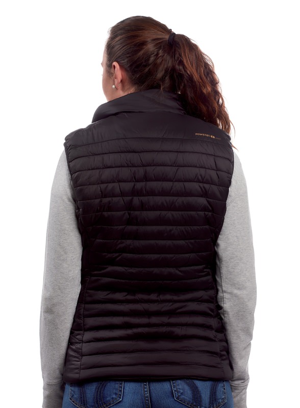 Wärmeweste Damen Rückansicht Rückansicht der Therm-ic Heated Vest Women, eine gesteppte, schwarze Daunenweste über einem grauen Langarmshirt.