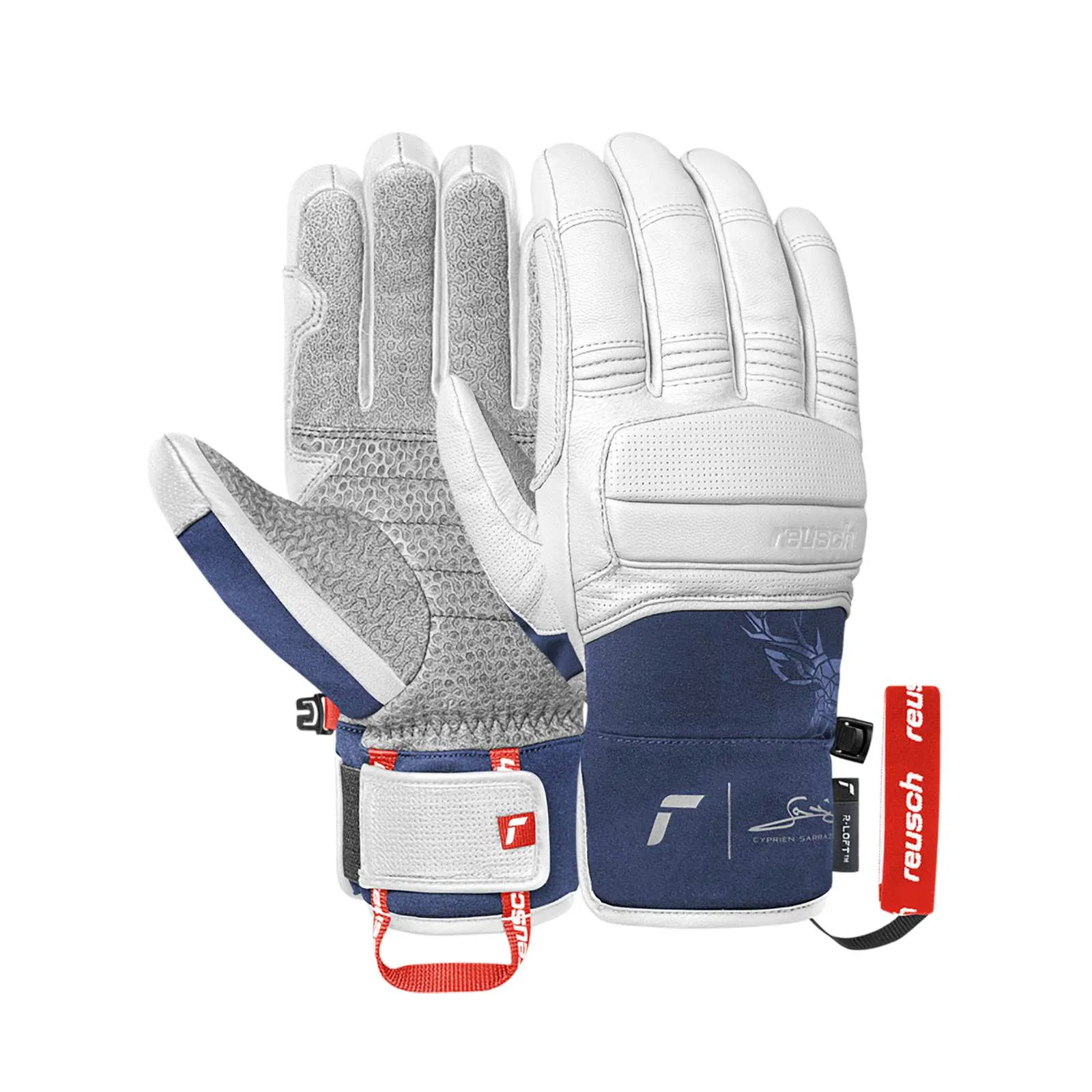 Zwei Ski-Handschuhe von Reusch, weißes Leder mit dunkelblauen Akzenten und floralem Muster, liegen vor einem weißen Hintergrund.