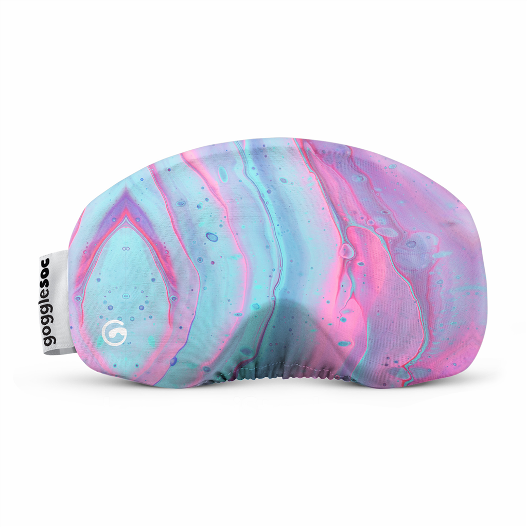 Marmorierte Schutzbrille Die Paint Soc ist eine Ski- & Snowboardbrillen-Schutzhülle. Sie ist hellblau, rosa und lila mit einem marmorierten Muster.